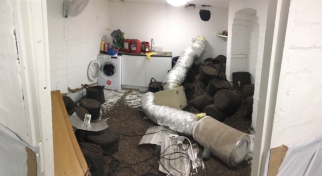 Room after police raid before cleaning