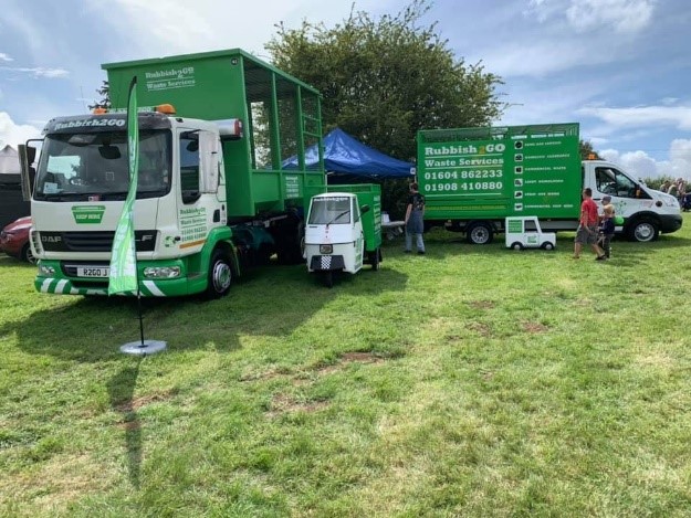 Selection of rubbish 2 go vehicles on display at festival